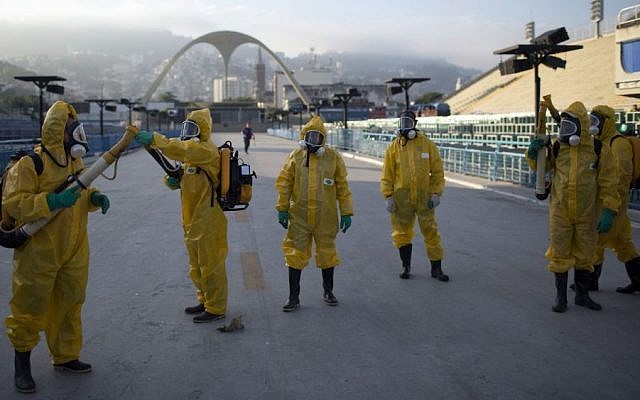 In this Tuesday, Jan. 26, 2016 file photo, health workers get ready to spray insecticide to combat the Aedes aegypti mosquitoes that transmits the Zika virus, under the bleachers of the Sambadrome in Rio de Janeiro, used for the Archery competition in the 2016 summer games. (AP/Leo Correa, File) In this Tuesday, Jan. 26, 2016 file photo, health workers get ready to spray insecticide to combat the Aedes aegypti mosquitoes that transmits the Zika virus, under the bleachers of the Sambadrome in Rio de Janeiro, used for the Archery competition in the 2016 summer games. (AP/Leo Correa, File)