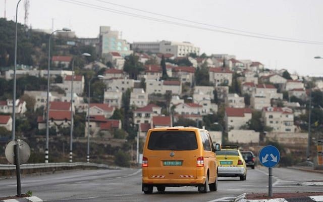 Illustrative: Two Palestinian cars near the Israeli settlement of Efrat in the West Bank on November 24, 2009. (Nati Shohat/Flash90) Illustrative: Two Palestinian cars near the Israeli settlement of Efrat in the West Bank on November 24, 2009. (Nati Shohat/Flash90)