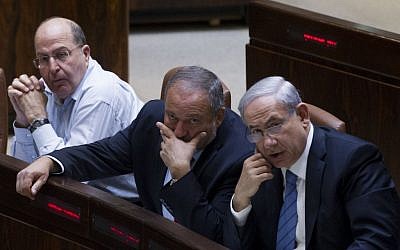 Prime Minister Benjamin Netanyahu, right, Avigdor Liberman, center, and Defense Minister Moshe Ya'alon in the Knesset on November 12, 2014. (Miriam Alster/FLASH90)