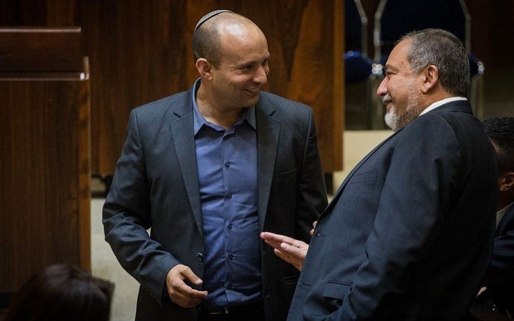 Then Jewish Home party leader Naftali Bennett (left) and Yisrael Beytenu chairman Avigdor Liberman at the Knesset on July 22, 2015. (Hadas Parush/Flash90)