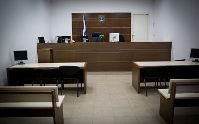 Illustration of God either present or not in a magistrate's courtroom, January 18, 2016. (Nati Shohat/FLASH90)
