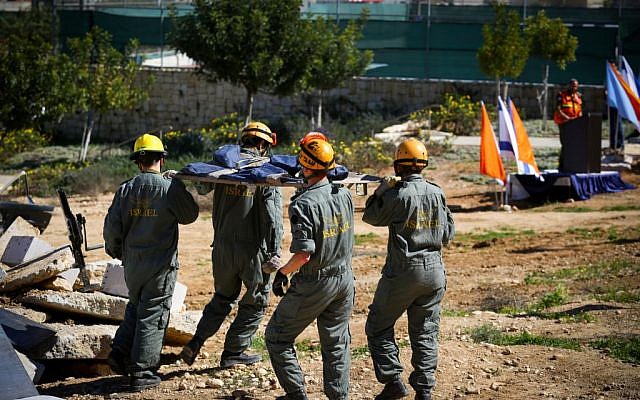 Illustrative photo of IDF Home Front Command soldiers participating in a drill as part of a nationwide exercise at the Yuvali HaNegev school in the Bnei Shimon regional council in southern Israel, on February 15, 2016. (Flash90) Illustrative photo of IDF Home Front Command soldiers participating in a drill as part of a nationwide exercise at the Yuvali HaNegev school in the Bnei Shimon regional council in southern Israel, on February 15, 2016. (Flash90)