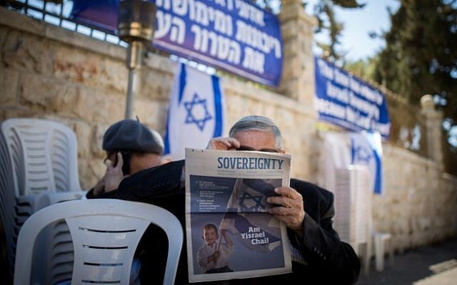 Members of the right-wing "Women in Green" movement hold 33-hour vigil near Prime Minister Benjamin Netanyahu's residence in Jerusalem, demanding Israeli sovereignty and the defeat of Arab terror, on February 28, 2016. (Miriam Alster/FLASH90) Members of the right-wing "Women in Green" movement hold 33-hour vigil near Prime Minister Benjamin Netanyahu's residence in Jerusalem, demanding Israeli sovereignty and the defeat of Arab terror, on February 28, 2016. (Miriam Alster/FLASH90)