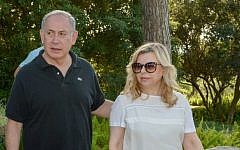 Prime Minister Benjamin Netanyahu and his wife, Sara, tour Ramat Hanadiv, a nature park in northern Israel, April 25, 2016. (Amos Ben Gershom/GPO)