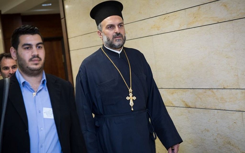 Father Gabriel Naddaf, right, seen at the Knesset on May 9, 2016. (Hadas Parush/Flash90)