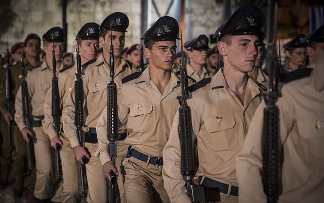 Israeli soldiers march during a Memorial Day ceremony at the Western Wall in Jerusalem's Old City, May 10, 2016 (Hadas Parush/Flash90) Israeli soldiers march during a Memorial Day ceremony at the Western Wall in Jerusalem's Old City, May 10, 2016 (Hadas Parush/Flash90)