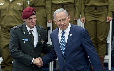 Prime minister Benjamin Netanyahu, right, shakes hands with IDF Deputy Chief of Staff Maj. Gen. Yair Golan at a ceremony for outstanding soldiers on Israel's 68th Independence Day celebrations, at the President's Residence in Jerusalem, May 12, 2016. (Yonatan Sindel/Flash90) Prime minister Benjamin Netanyahu, right, shakes hands with IDF Deputy Chief of Staff Maj. Gen. Yair Golan at a ceremony for outstanding soldiers on Israel's 68th Independence Day celebrations, at the President's Residence in Jerusalem, May 12, 2016. (Yonatan Sindel/Flash90)