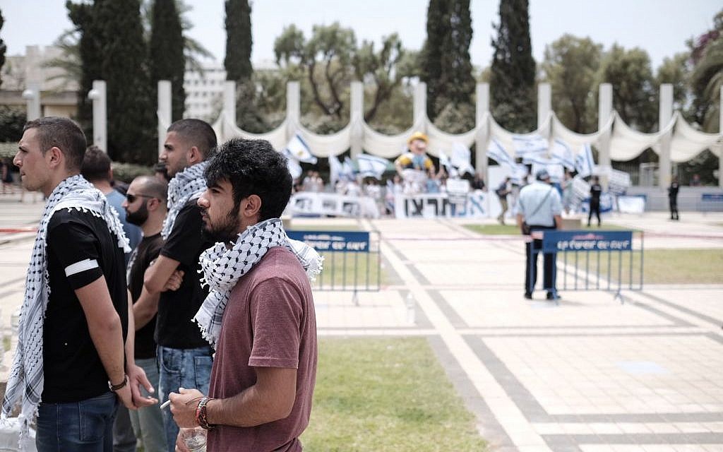 Arab Israeli and left wing student activists hold a memorial service during a rally marking the Nakba anniversary at the Tel Aviv University in Tel Aviv on May 15, 2016. (Tomer Neuberg/Flash90)