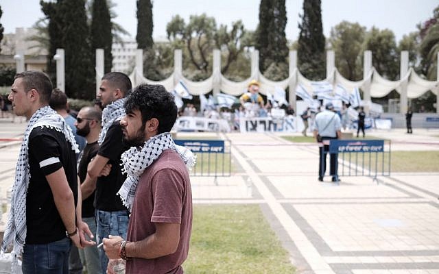 Arab Israeli and left wing student activists hold a memorial service during a rally marking the Nakba anniversary at the Tel Aviv University in Tel Aviv on May 15, 2016. (Tomer Neuberg/Flash90)