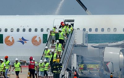 Israeli forces take part in a training exercise simulating a plane crash at Ben-Gurion International Airport outside Tel Aviv, May 17, 2016. (Flash90)
