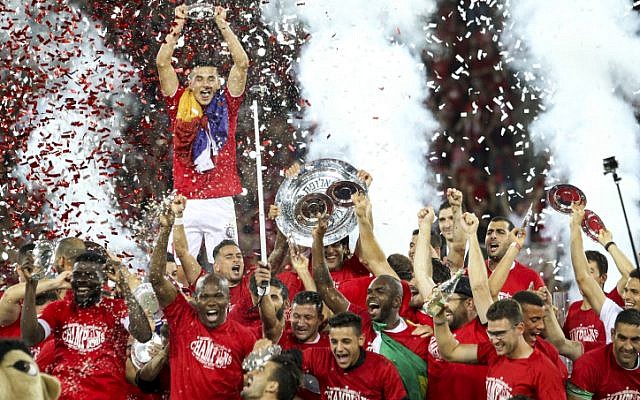 Hapoel Beersheba F.C. soccer players celebrate after winning the Israeli League championship for the first time in 40 years in Beersheba on May 21, 2016. (Danny Meron/Flash90) Hapoel Beersheba F.C. soccer players celebrate after winning the Israeli League championship for the first time in 40 years in Beersheba on May 21, 2016. (Danny Meron/Flash90)