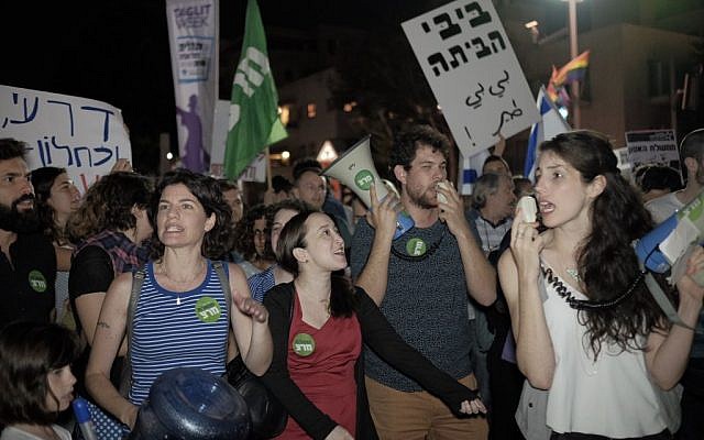 Activists protest at Habima Square in central Tel Aviv against the appointment of right wing politician, Avigdor Liberman, to defense minister, on May 21, 2016. (Tomer Neuberg/FLASH90)
