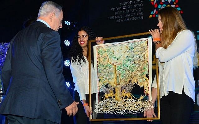 Prime Minister Benjamin Netanyahu is presented with a diagram of his family tree during the inauguration ceremony of a new section of Beit Hatfutsot, the Museum of the Jewish People, May 24, 2016. (Kobi Gideon/GPO) Prime Minister Benjamin Netanyahu is presented with a diagram of his family tree during the inauguration ceremony of a new section of Beit Hatfutsot, the Museum of the Jewish People, May 24, 2016. (Kobi Gideon/GPO)