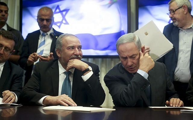 Prime Minister Benjamin Netanyahu (right) and leader of the Yisrael Beytenu political party Avigdor Liberman sign a coalition agreement in the Knesset on May 25, 2016 (Yonatan Sindel/FLASH90) Prime Minister Benjamin Netanyahu (right) and leader of the Yisrael Beytenu political party Avigdor Liberman sign a coalition agreement in the Knesset on May 25, 2016 (Yonatan Sindel/FLASH90)