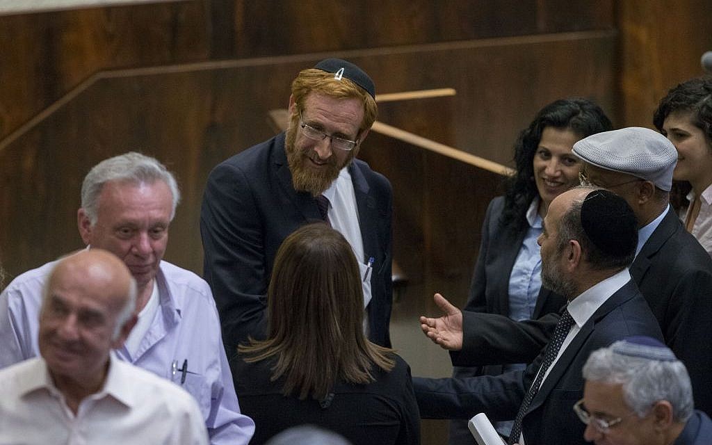 Likud MK Yehuda Glick is congratulate by fellow members of the Knesset after his swearing in, May 25, 2016. (Yonatan Sindel/Flash90) Likud MK Yehuda Glick is congratulate by fellow members of the Knesset after his swearing in, May 25, 2016. (Yonatan Sindel/Flash90)
