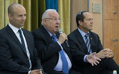 Israeli President Reuven Rivlin  with Education Minister Naftali Bennett and Jerusalem Mayor Nir Barkat during a meeting with high school students in Jerusalem, on May 29, 2016. (Yonatan Sindel/Flash90)