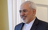 Iran's Foreign Minister Mohammad Javad Zarif smiles during a meeting with Finland's Foreign Minister Timo Soini in Helsinki on Tuesday May 31, 2016. (Vesa Moilanen/Lehtikuva via AP)