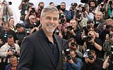 Actor George Clooney poses for photographers during a photo call for the film 'Money Monster' at the 69th international film festival, Cannes, France, May 12, 2016. (AP/Thibault Camus)
