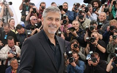 Actor George Clooney poses for photographers during a photo call for the film 'Money Monster' at the 69th international film festival, Cannes, France, May 12, 2016. (AP/Thibault Camus) Actor George Clooney poses for photographers during a photo call for the film 'Money Monster' at the 69th international film festival, Cannes, France, May 12, 2016. (AP/Thibault Camus)