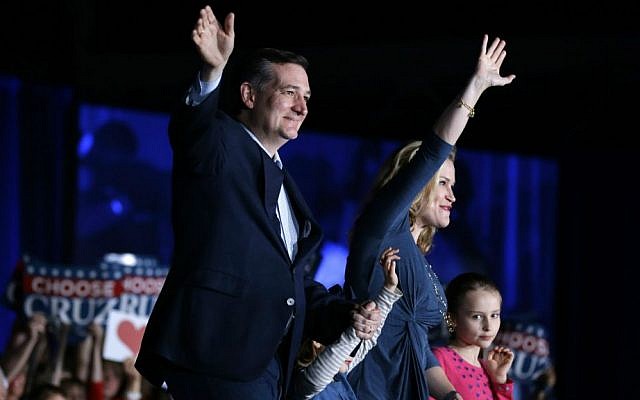 Republican presidential candidate Sen. Ted Cruz, R-Texas, waves with his wife Heidi and daughters Caroline, right, and Catherine during a rally at the Indiana State Fairgrounds in Indianapolis, Monday, May 2, 2016. (AP Photo/Michael Conroy)