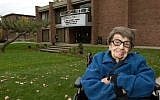 Goldie Michelson in 2008 by the theater that bears her name. (Clark University)