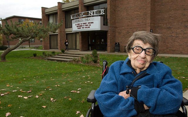 Goldie Michelson in 2008 by the theater that bears her name. (Clark University)
