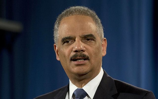 In this March 4, 2015 file photo, then-attorney general Eric Holder speaks at the Justice Department in Washington. (AP Photo/Carolyn Kaster) In this March 4, 2015 file photo, then-attorney general Eric Holder speaks at the Justice Department in Washington. (AP Photo/Carolyn Kaster)