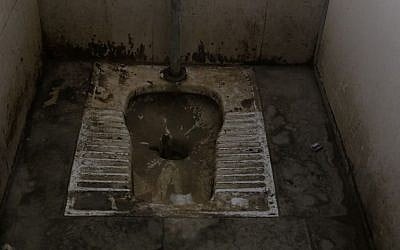 IMG_4025 Image of the single toilet still operation at the Qalandiya crossing, taken of May 3, 2016. (Luke Tress / Times of Israel)