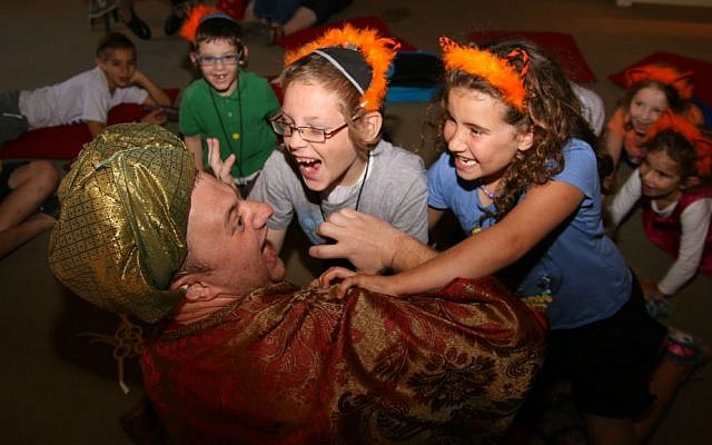 Children engage with storyteller at Tower of David Museum's Passover program for families with children with special needs, April 2016 (Ricky Rachman) Children engage with storyteller at Tower of David Museum's Passover program for families with children with special needs, April 2016 (Ricky Rachman)