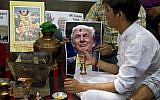 Activists of right-wing Hindu Sena or Hindu Army conduct Hindu rituals to ensure a win for U.S. presidential candidate Donald Trump, in New Delhi, India, Wednesday, May 11, 2016. (AP Photo/Saurabh Das)