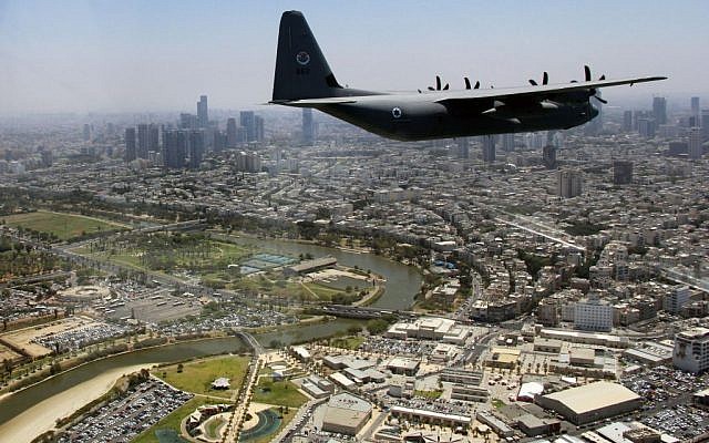 A C-130J Super Hercules cargo plane flies over Tel Aviv's Hayarkon River as part of the Israeli Air Force's annual flyby on Independence Day, May 12, 2016. (Judah Ari Gross/Times of Israel) A C-130J Super Hercules cargo plane flies over Tel Aviv's Hayarkon River as part of the Israeli Air Force's annual flyby on Independence Day, May 12, 2016. (Judah Ari Gross/Times of Israel)