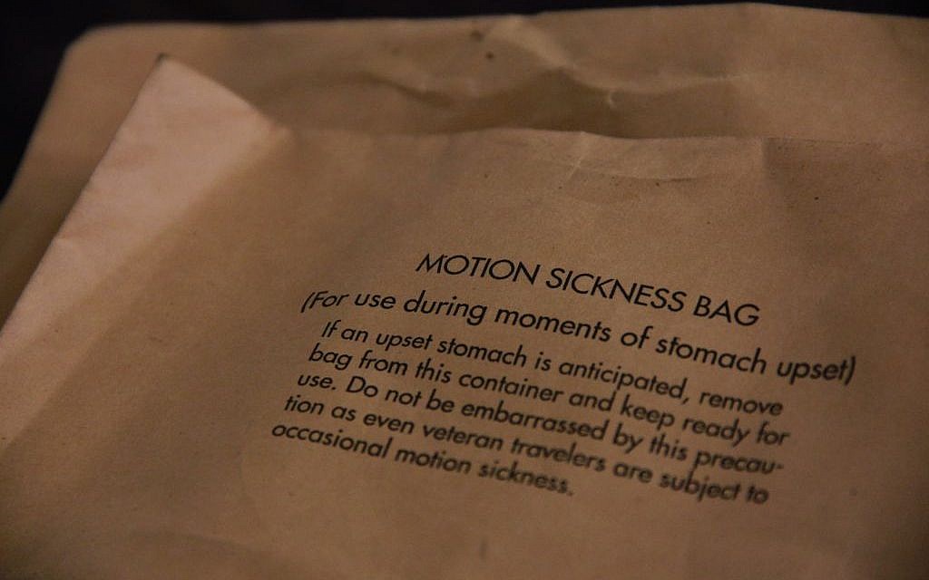 A motion sickness bag provided by the air force. 'Even veteran travelers are subject to occasional motion sickness,' the envelope for the bag reads. (Judah Ari Gross/Times of Israel)