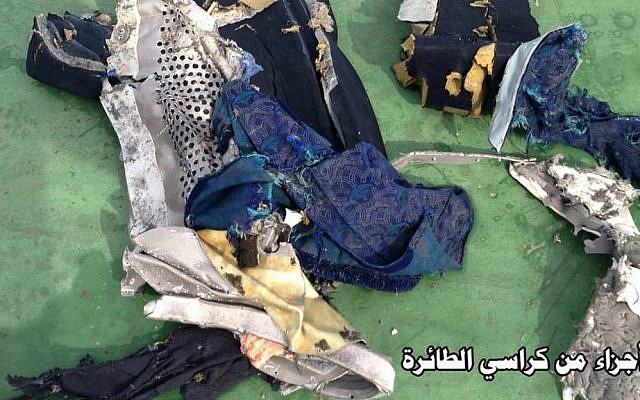 This picture posted Saturday, May 21, 2016 on the official Facebook page of the Egyptian military's spokesman shows part of a plane chair from EgyptAir flight 804. Search crews found floating human remains, luggage and seats from the doomed EgyptAir jetliner Friday but face a potentially more complex task in locating bigger pieces of wreckage and the black boxes vital to determining why the plane plunged into the Mediterranean. Arabic reads: “Part of plane chair.” (Egyptian Armed Forces via AP) This picture posted Saturday, May 21, 2016 on the official Facebook page of the Egyptian military's spokesman shows part of a plane chair from EgyptAir flight 804. Search crews found floating human remains, luggage and seats from the doomed EgyptAir jetliner Friday but face a potentially more complex task in locating bigger pieces of wreckage and the black boxes vital to determining why the plane plunged into the Mediterranean. Arabic reads: “Part of plane chair.” (Egyptian Armed Forces via AP)