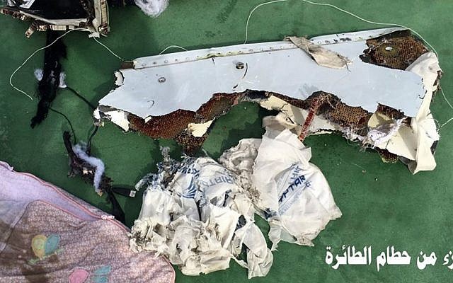 This picture posted Saturday, May 21, 2016, on the official Facebook page of the Egyptian military's spokesman shows part of the wreckage from EgyptAir flight 804. Arabic reads: 'Part of plane wreckage.' (Egyptian Armed Forces Facebook via AP)