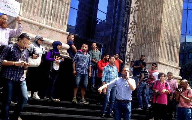 Journalists chant slogans during a protest in front of the Journalists' Syndicate in Cairo, Egypt, Monday, May 2, 2016. (AP Photo/Brian Rohan) Journalists chant slogans during a protest in front of the Journalists' Syndicate in Cairo, Egypt, Monday, May 2, 2016. (AP Photo/Brian Rohan)