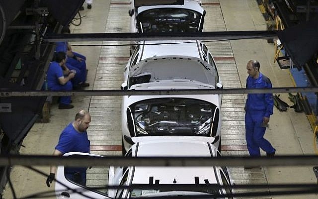 Iranian car workers assemble cars at the state-run Iran Khodro automobile manufacturing plant, just outside Tehran, Iran, April 25, 2015 (AP Photo/Vahid Salemi) Iranian car workers assemble cars at the state-run Iran Khodro automobile manufacturing plant, just outside Tehran, Iran, April 25, 2015 (AP Photo/Vahid Salemi)