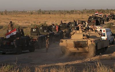 Iraqi military forces prepare for an offensive into Fallujah to retake the city from Islamic State militants in Iraq, Monday, May 30, 2016. (AP Photo/Khalid Mohammed)