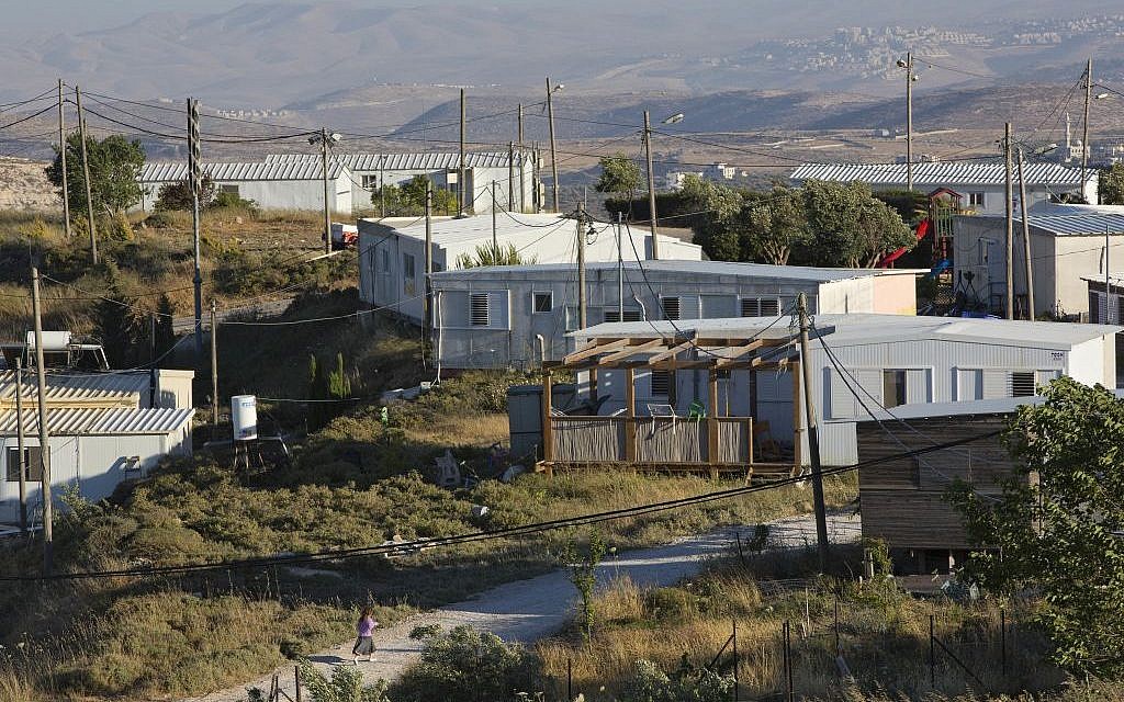 This May 18, 2016 photo shows buildings in Amona, an Israeli settlement outpost in the West Bank, east of Ramallah. (AP Photo/Oded Balilty) This May 18, 2016 photo shows buildings in Amona, an Israeli settlement outpost in the West Bank, east of Ramallah. (AP Photo/Oded Balilty)