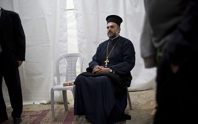 Father Gabriel Naddaf on Monday, May 9, 2016, at a rehearsal for the upcoming Independence Day ceremony in Jerusalem. (AP Photo/Oded Balilty) Father Gabriel Naddaf on Monday, May 9, 2016, at a rehearsal for the upcoming Independence Day ceremony in Jerusalem. (AP Photo/Oded Balilty)