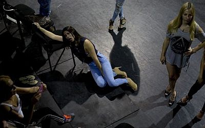In this Sunday, May 22, 2016 photo, contestants in the first Miss Trans Israel beauty pageant, rest during rehearsal in Tel Aviv, Israel. (AP Photo/Oded Balilty)