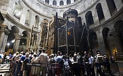 Christian pilgrims wait in line to visit the tomb of Jesus in the Church of Holy Sepulchre in Jerusalem Friday, May 20, 2016. (AP Photo/Mahmoud Illean)