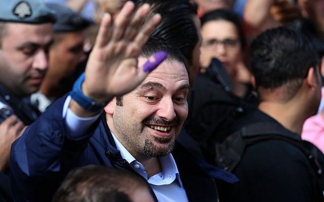 Lebanese prime minister Saad Hariri waves to his supporters after casting his ballot during municipal elections, outside a voting station in Beirut, Lebanon, May 8, 2016. (AP/Hussein Malla) Lebanese prime minister Saad Hariri waves to his supporters after casting his ballot during municipal elections, outside a voting station in Beirut, Lebanon, May 8, 2016. (AP/Hussein Malla)