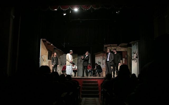 In this Thursday, April 28, 2016 photo, Palestinian actors perform a Gaza version of Shakespeare's "Romeo and Juliet" play on the stage of a cultural center in Gaza City. (AP Photo/Khalil Hamra) In this Thursday, April 28, 2016 photo, Palestinian actors perform a Gaza version of Shakespeare's "Romeo and Juliet" play on the stage of a cultural center in Gaza City. (AP Photo/Khalil Hamra)