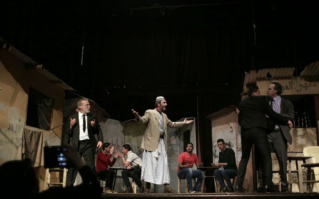 In this Thursday, April 28, 2016 photo, Palestinian actors perform a Gaza version of Shakespeare's "Romeo and Juliet" play on the stage of a cultural center in Gaza City. (AP Photo/Khalil Hamra) In this Thursday, April 28, 2016 photo, Palestinian actors perform a Gaza version of Shakespeare's "Romeo and Juliet" play on the stage of a cultural center in Gaza City. (AP Photo/Khalil Hamra)