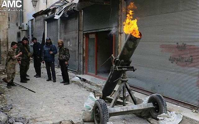 Syrian rebels fire locally made shells against Syrian government forces, in Aleppo, Syria, February 15, 2015 (AP Photo/Aleppo Media Center, Aleppo Media Center)
