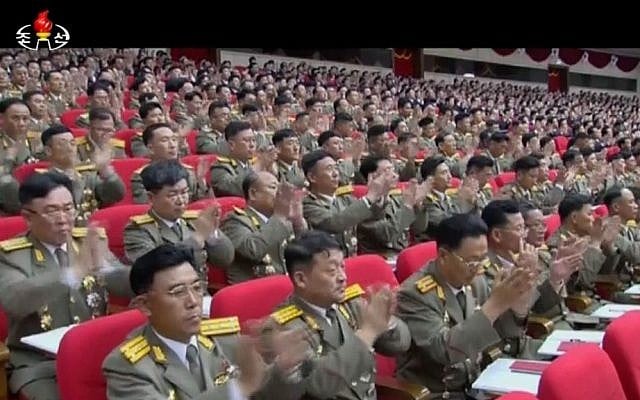 In this image made from video by North Korean broadcaster KRT, military officers applaud as North Korean leader Kim Jong Un gives a speech at the party congress in Pyongyang, North Korea, Saturday, May 7, 2016. (KRT via AP Video)