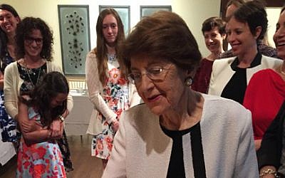 This April 22, 2016 photo provided by Jeanette Lerman-Neubauer shows Auschwitz survivor Rosalie Chris Lerman at Passover Seder. (Jeanette Lerman-Neubauer via AP)