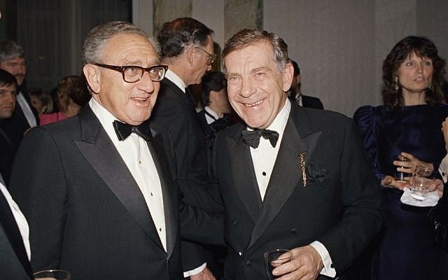  In this March 3, 1988 file photo, Henry Kissinger, left, and Morley Safer of CBS' "60 Minutes" pose during reception for the program in New York. Safer, the veteran “60 Minutes” correspondent who exposed a military atrocity in Vietnam that played an early role in changing Americans’ view of the war, died Thursday, May 19, 2016. He was 84. (AP Photo/Mark Lennihan, File)