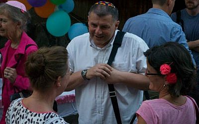 Originally from Strasbourg, Rabbi René Pfertzel, center, came to Britain 15 years ago and now leads a French-language service at a London Liberal Jewish Synagogue. He's pictured here in Amsterdam, August 2014 (Courtesy of Pfertzel/via JTA)