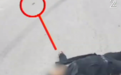 A wounded assailant lying some distance from a knife in Hebron on March 24, 2016 (Channel 2 screenshot) A wounded assailant lying some distance from a knife in Hebron on March 24, 2016 (Channel 2 screenshot)